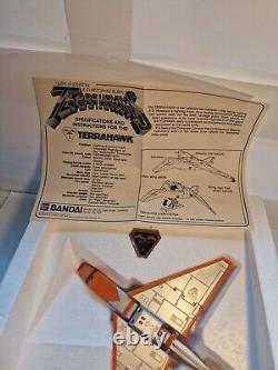 RARE Vintage Terrahawks Bandai Diecast Terrahawk ship MINT in Box<br/>		
<br/>
	Traduction en français : 
 <br/>
RARE Vaisseau Terrahawk Bandai Diecast Vintage dans sa boîte, comme neuf